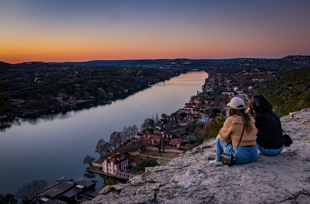 People watching the sunset from Mount Bonnell in Austin, Texas